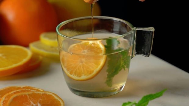 Glass of warm water with lemon and honey